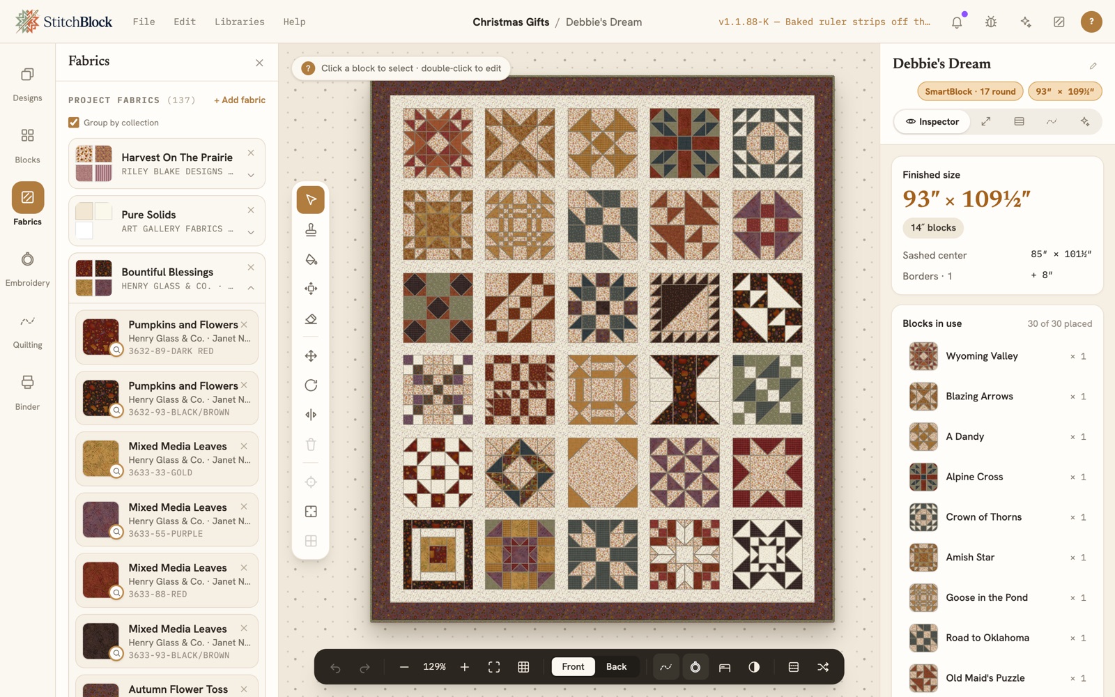 The same quilt in Henry Glass fabrics from the Bountiful Blessings collection, cream sashing and a plum border, with the Fabrics panel listing each print